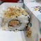 SushiÂ is aÂ Japanese dishÂ of prepared vinegared rice, usually with some sugar and salt, accompanied by a variety of ingredients